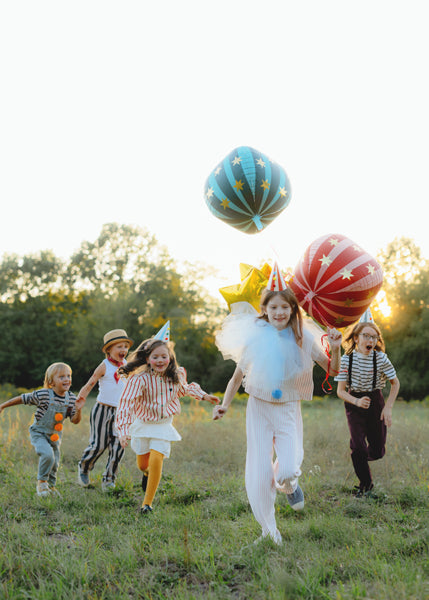 Ballon étoilé vert et or – Anniversaire Cirque