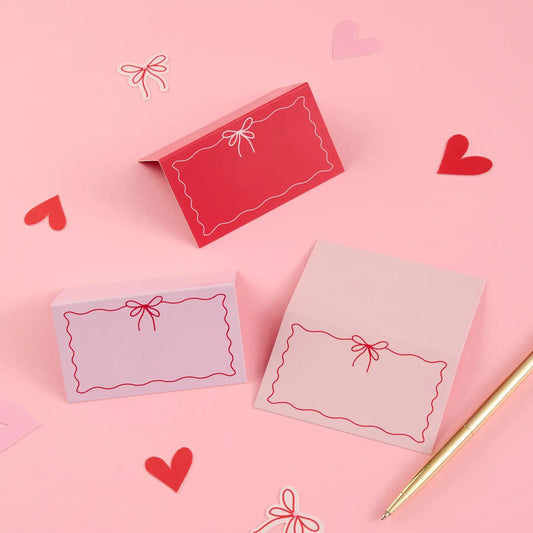 Cartes de placement nœud rose et rouge - Lot de 12