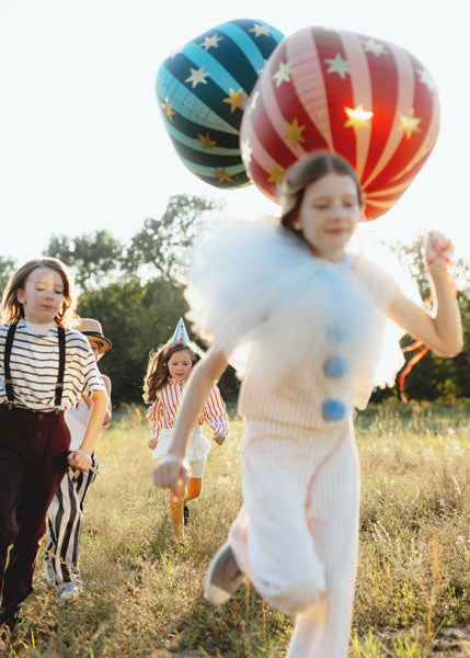 Ballon étoilé rouge et or – Anniversaire Cirque
